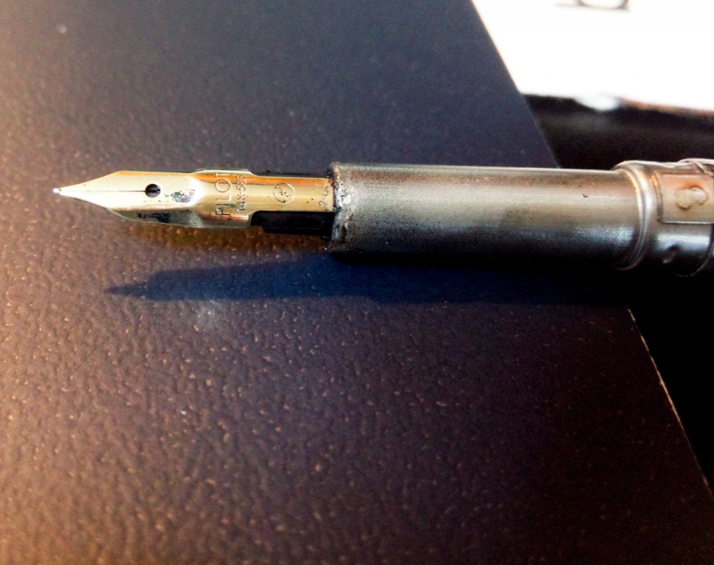 The nib section, pre-cleaning. I like the odd facets on the nib.